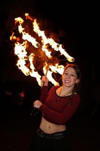 Lady blaze and her 9 wick fire parasol